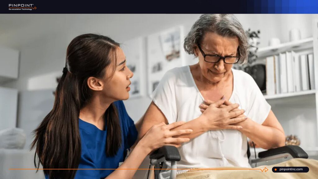 Caregiver supporting patient with chest discomfort during a discussion about radio frequency interference