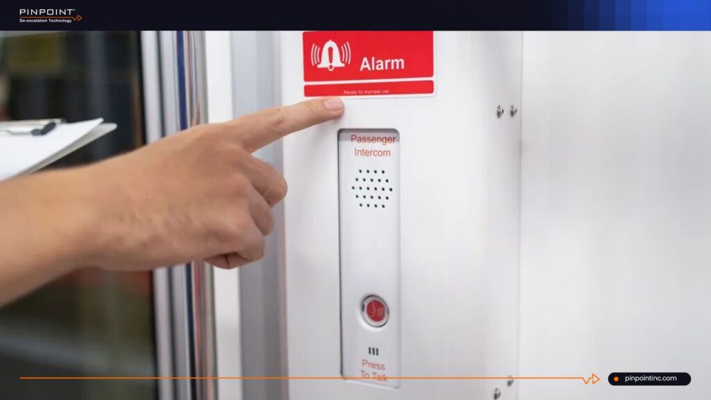 Wall-mounted panic button showing hidden safety risks for nurses in emergencies