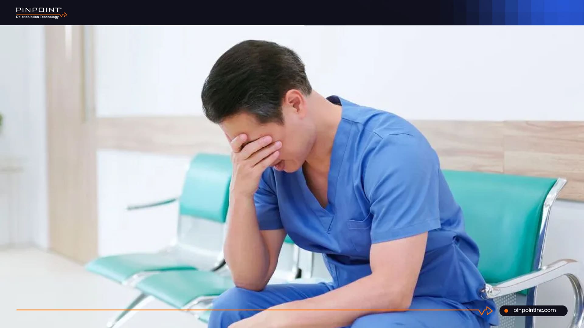 Burned out nurse sitting in hospital waiting area after workplace stress