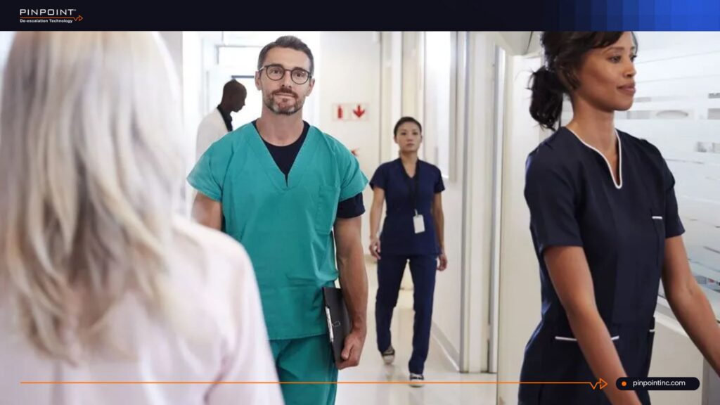 Healthcare staff in a hospital hallway showing the impact of tracking nurses
