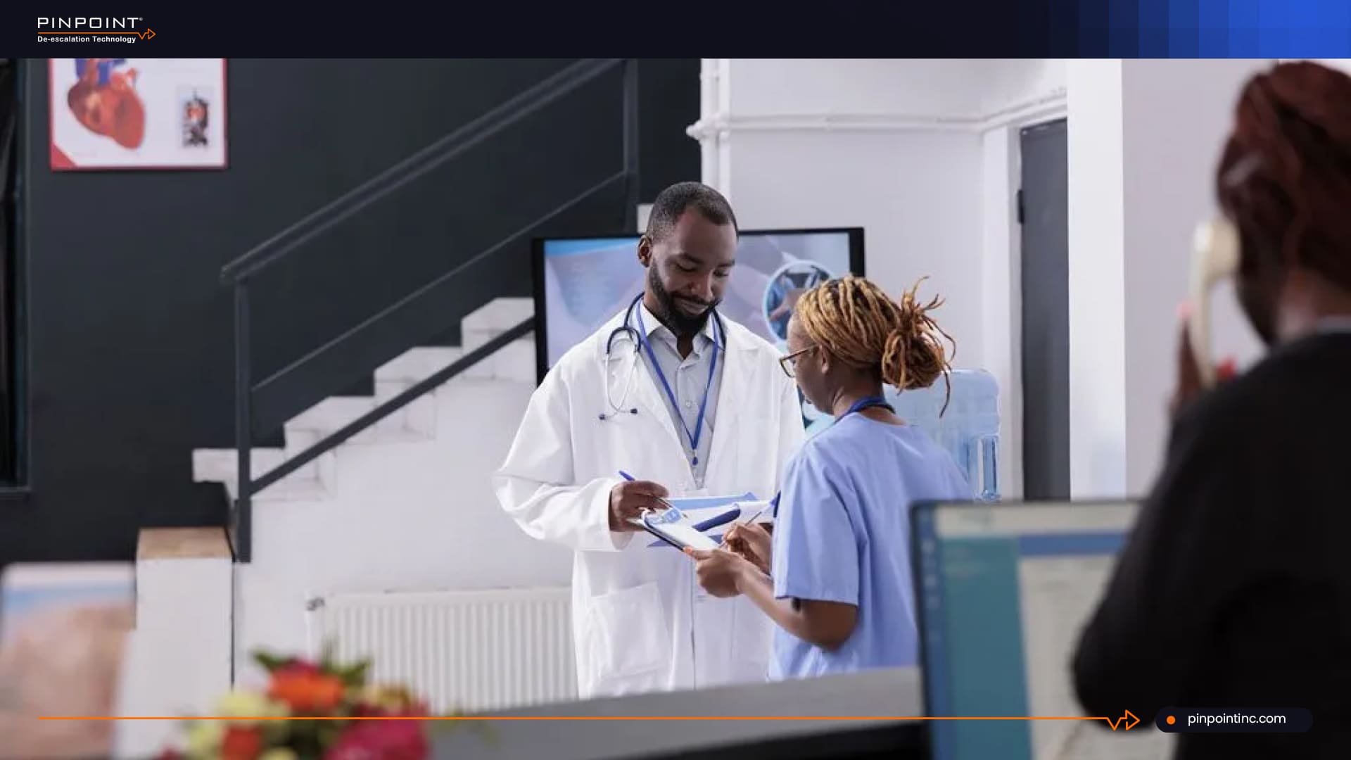 Doctor and nurse discussing patient care in a mental health unit