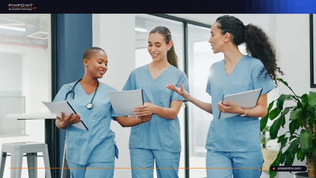 Nurses collaborating in a hospital to improve workplace safety and reduce turnover