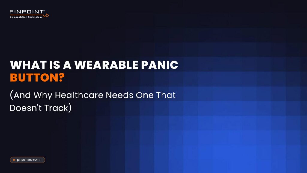Pinpoint De-escalation Technology blog cover titled 'What Is a Wearable Panic Button? And Why Healthcare Needs One That Doesn't Track' on a dark navy blue background.